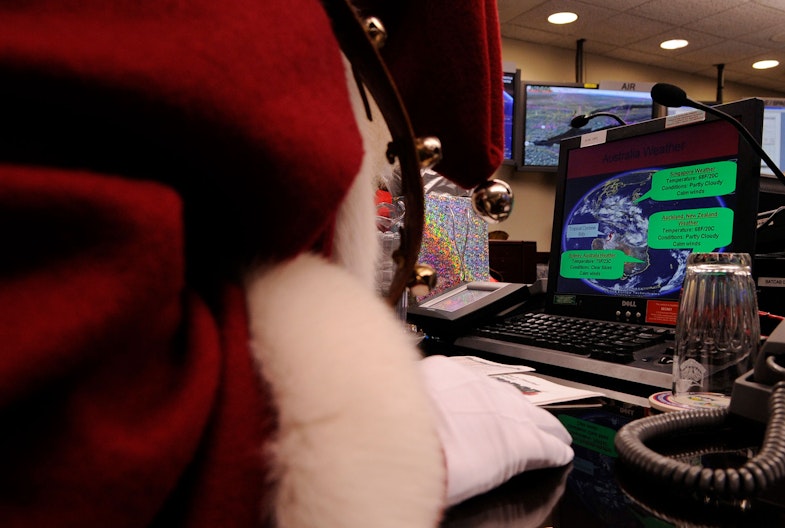Santa Claus makes a surprise visit to the North American Aerospace Defense Command Tracks Santa Battle Cab
